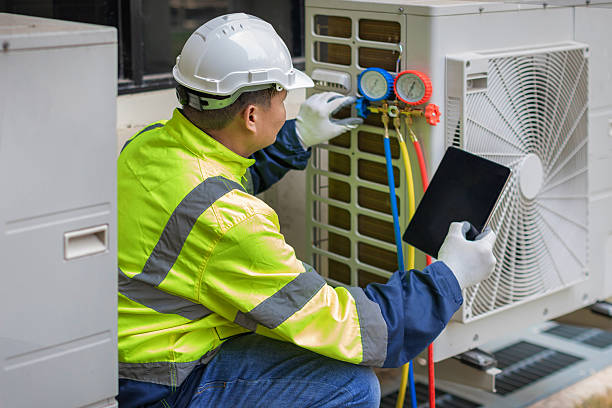 Professional Heat Pump Repair technician working in Dumont, NJ